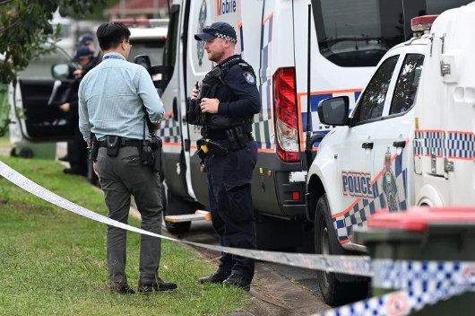 Police investigating in Lowood, Queensland, Australia on May 26.