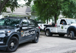 Police outside the Gilleys' house in Houston.