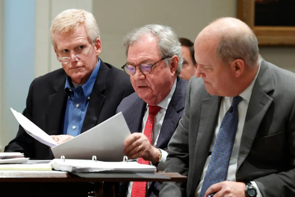 Alex Murdaugh with lawyers Dick Harpootlian and Jim Griffin during his murder trial in Jan. 2023.