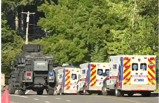 First responders at the scene of the shooting in Sandy, Ore.
